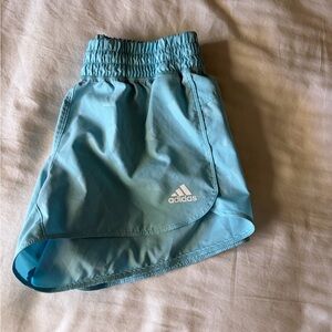 Light blue Adidas running shorts